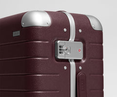 The Aluminum Edge Carry-On in Oxblood Red