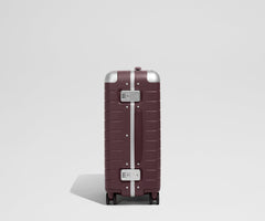 The Aluminum Edge Bigger Carry-On in Oxblood Red