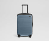 Clear Luggage Cover in The Bigger Carry-On