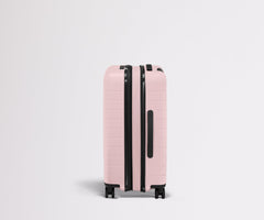 The Bigger Carry-On Flex in Blush Pink