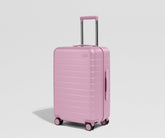 The Bigger Carry-On in Glacial Pink