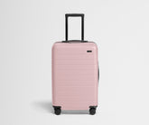The Bigger Carry-On in Blush Pink