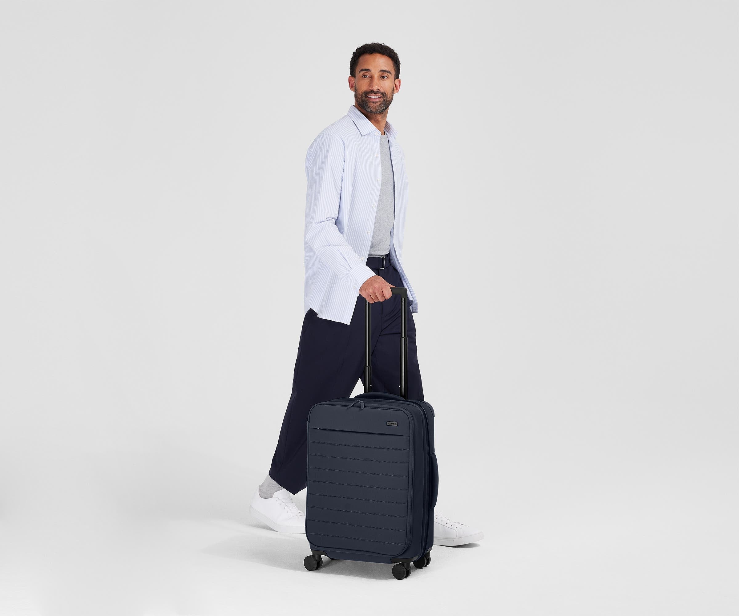 The Softside Bigger Carry-On in Navy Blue