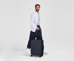 The Softside Bigger Carry-On in Navy Blue