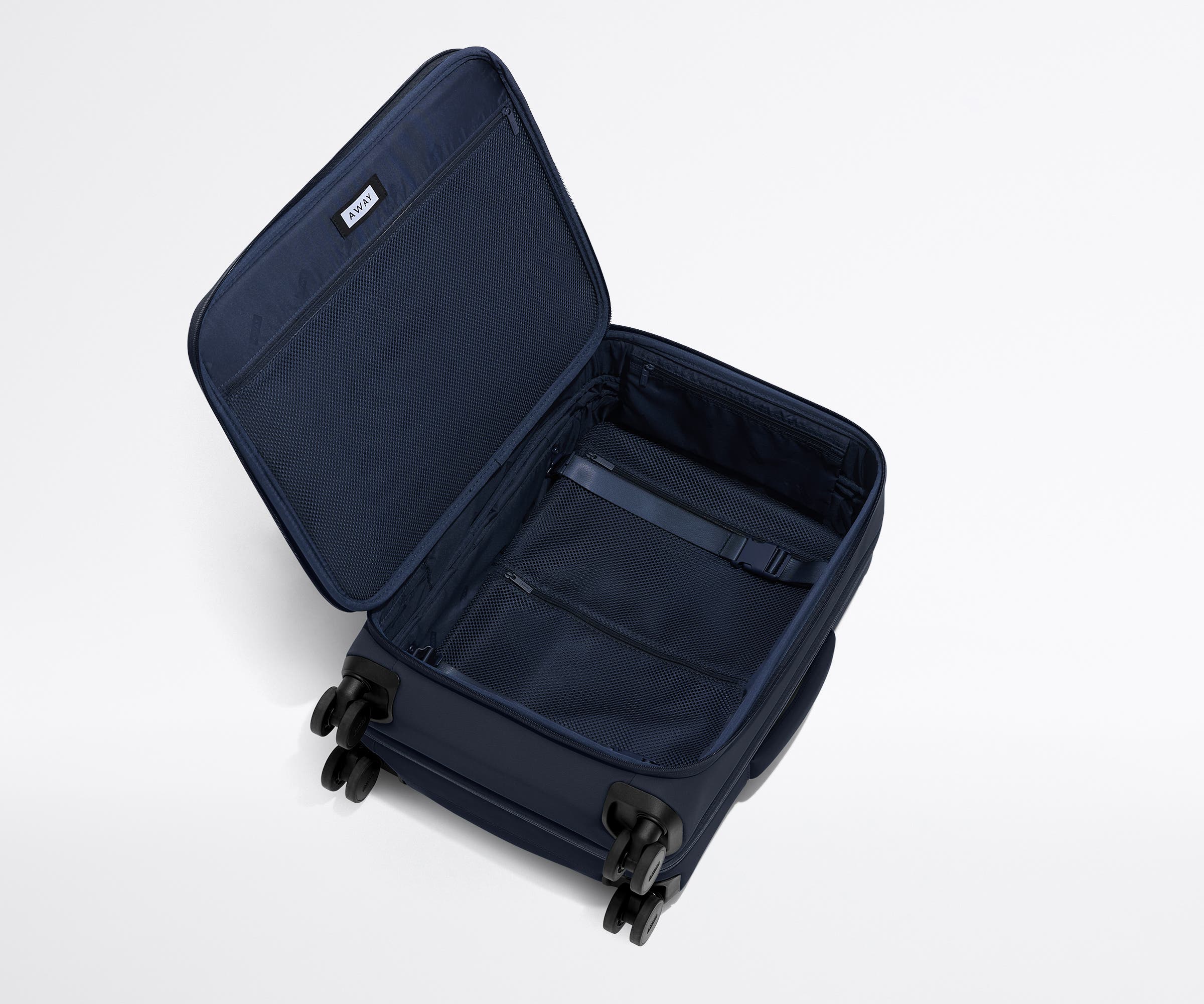 The Softside Bigger Carry-On in Navy Blue