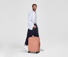 The Softside Bigger Carry-On in Clay Pink