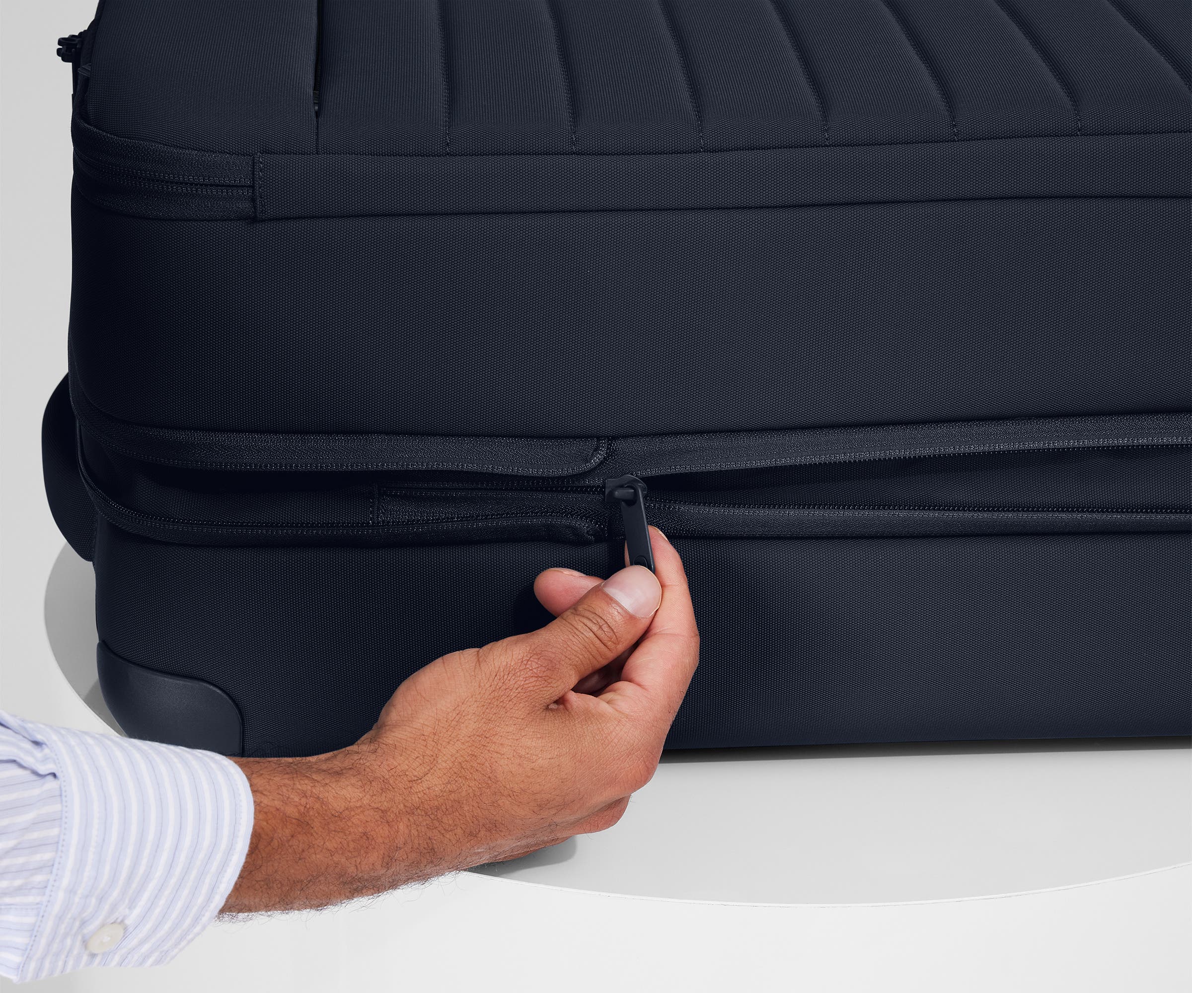 The Softside Carry-On in Navy Blue