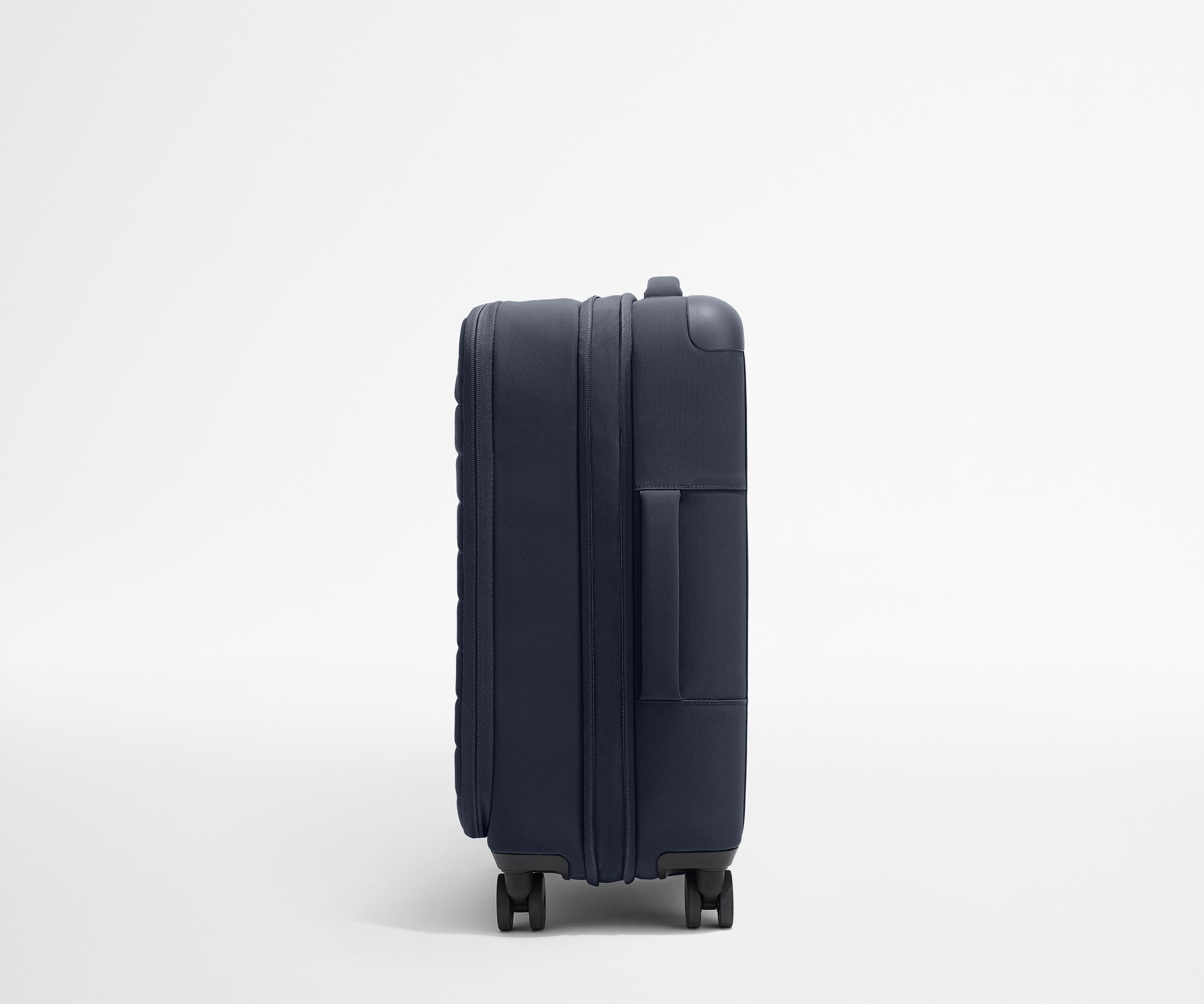 The Softside Bigger Carry-On in Navy Blue