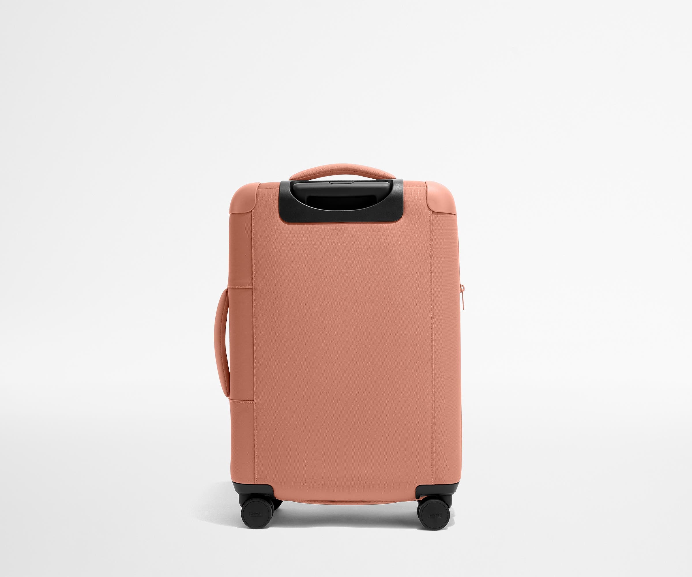 The Softside Bigger Carry-On in Clay Pink