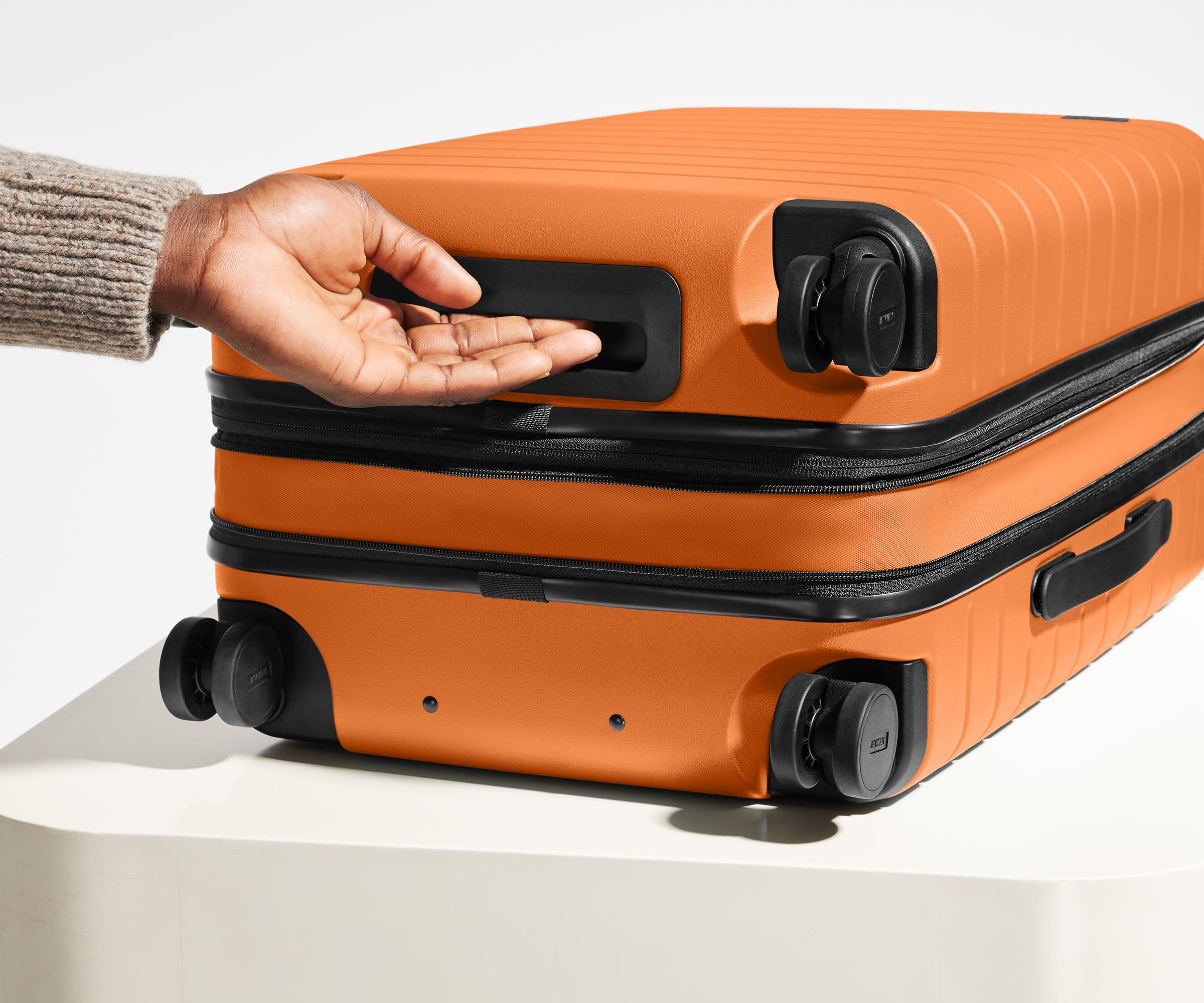 The Bigger Carry-On Flex in Sorbet Orange