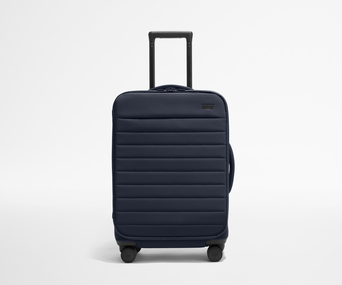 The Softside Bigger Carry-On in Navy Blue