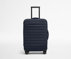 The Softside Bigger Carry-On in Navy Blue