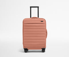 The Softside Bigger Carry-On in Clay Pink
