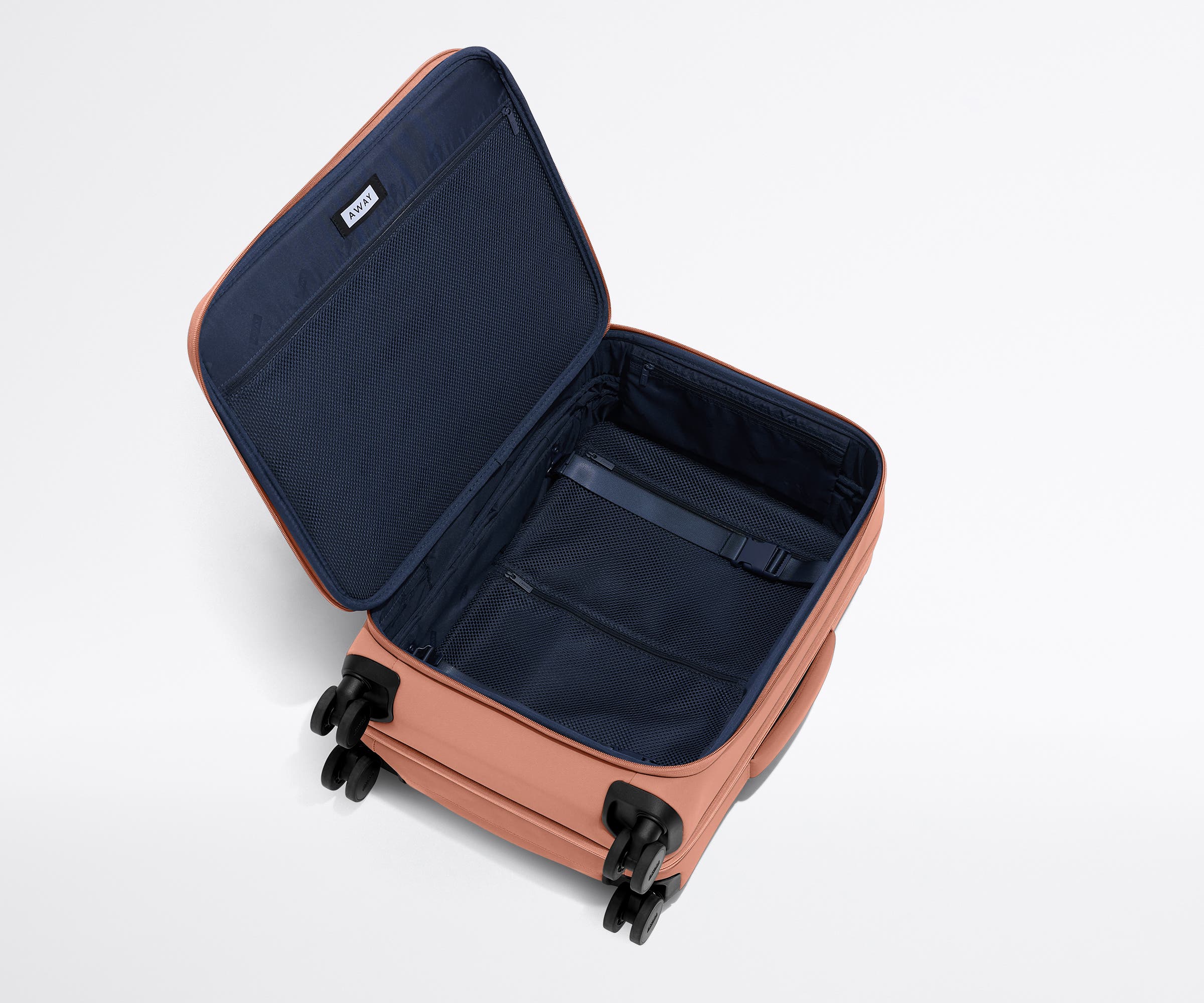 The Softside Bigger Carry-On in Clay Pink