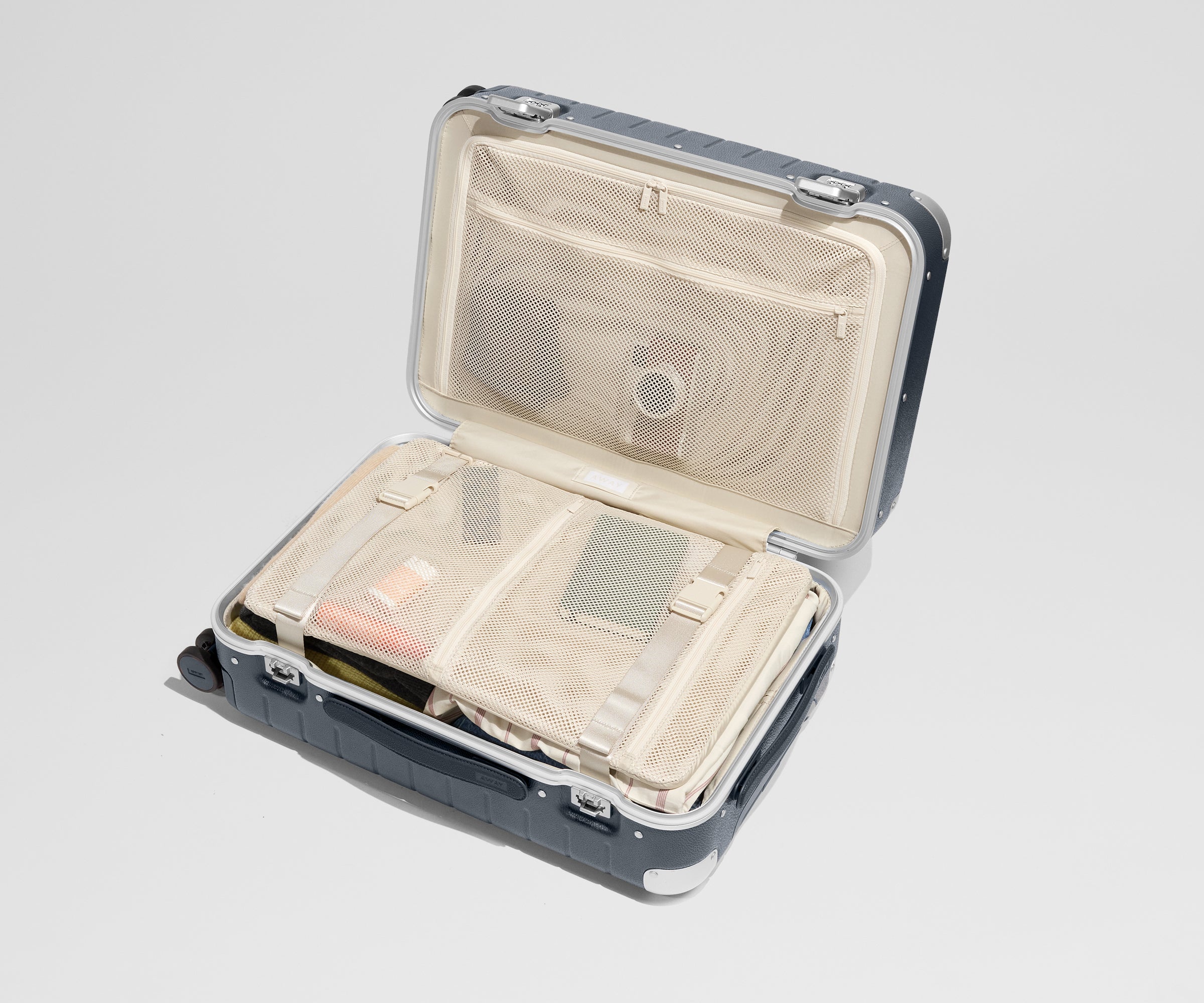 The Aluminum Edge Bigger Carry-On in Jet Black