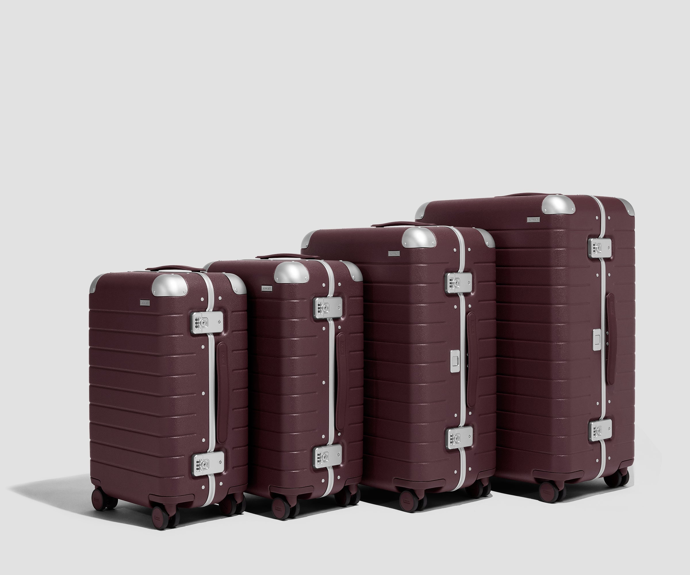 The Aluminum Edge Bigger Carry-On in Oxblood Red