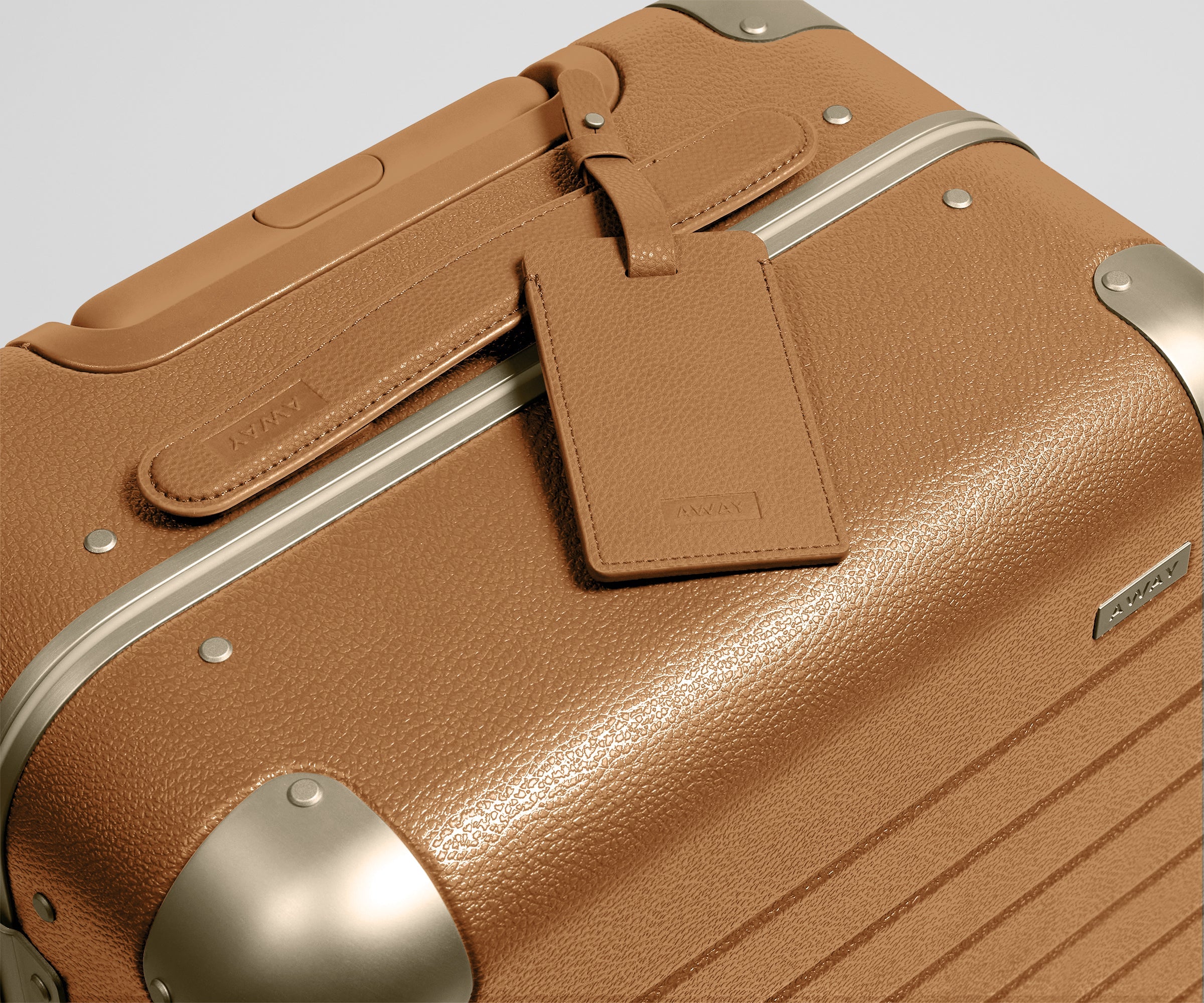 The Aluminum Edge Carry-On in Cognac Brown