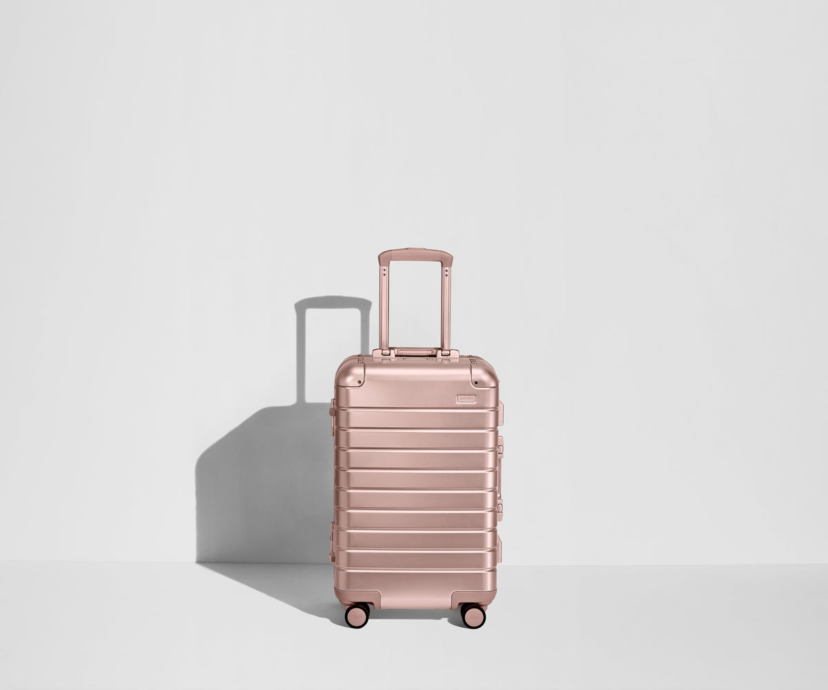 The Bigger Carry-On: Aluminum Edition in Rose Gold (with USB charger)