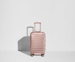 The Bigger Carry-On: Aluminum Edition in Rose Gold (with USB charger)