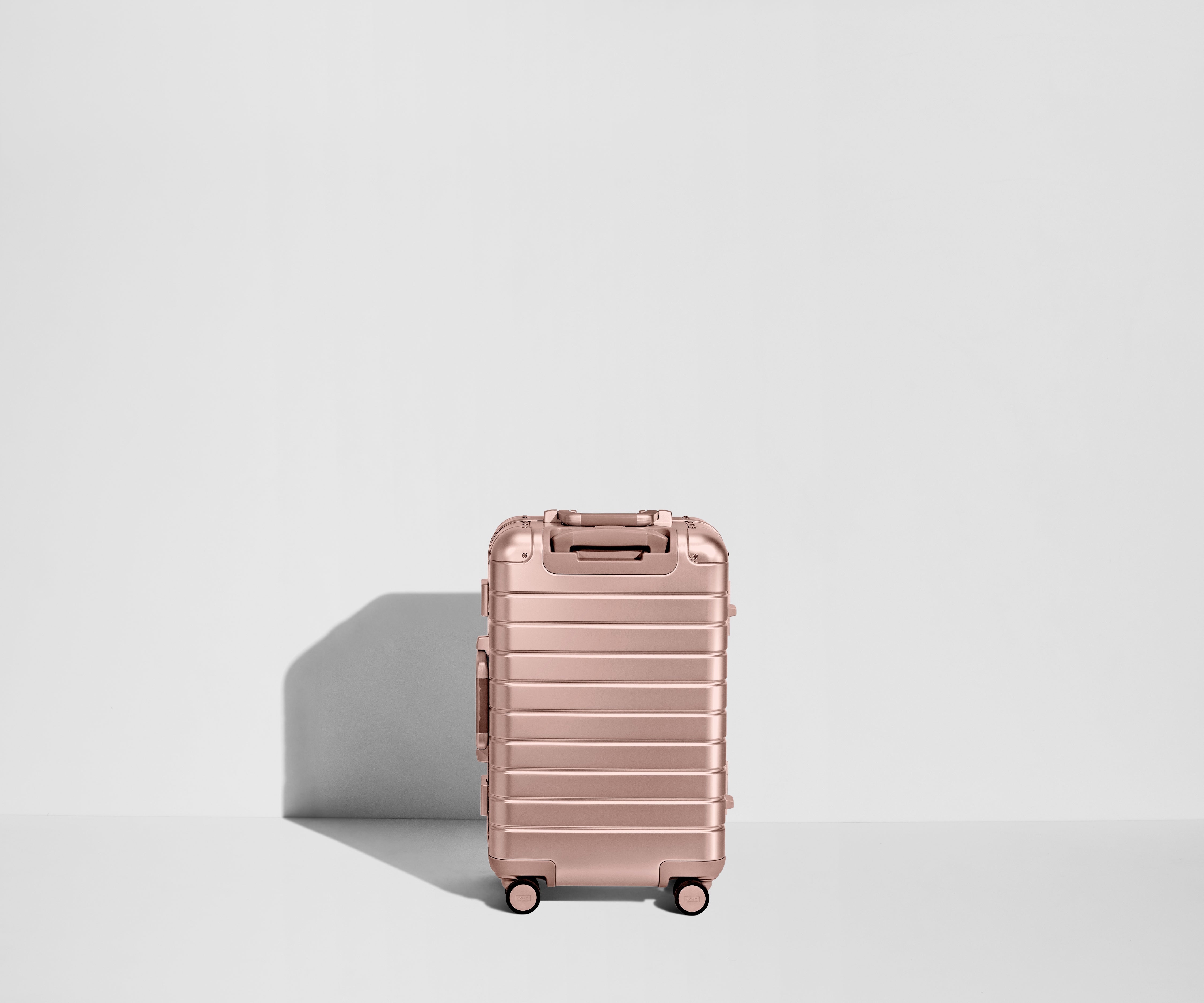 The Bigger Carry-On: Aluminum Edition in Rose Gold (with USB charger)