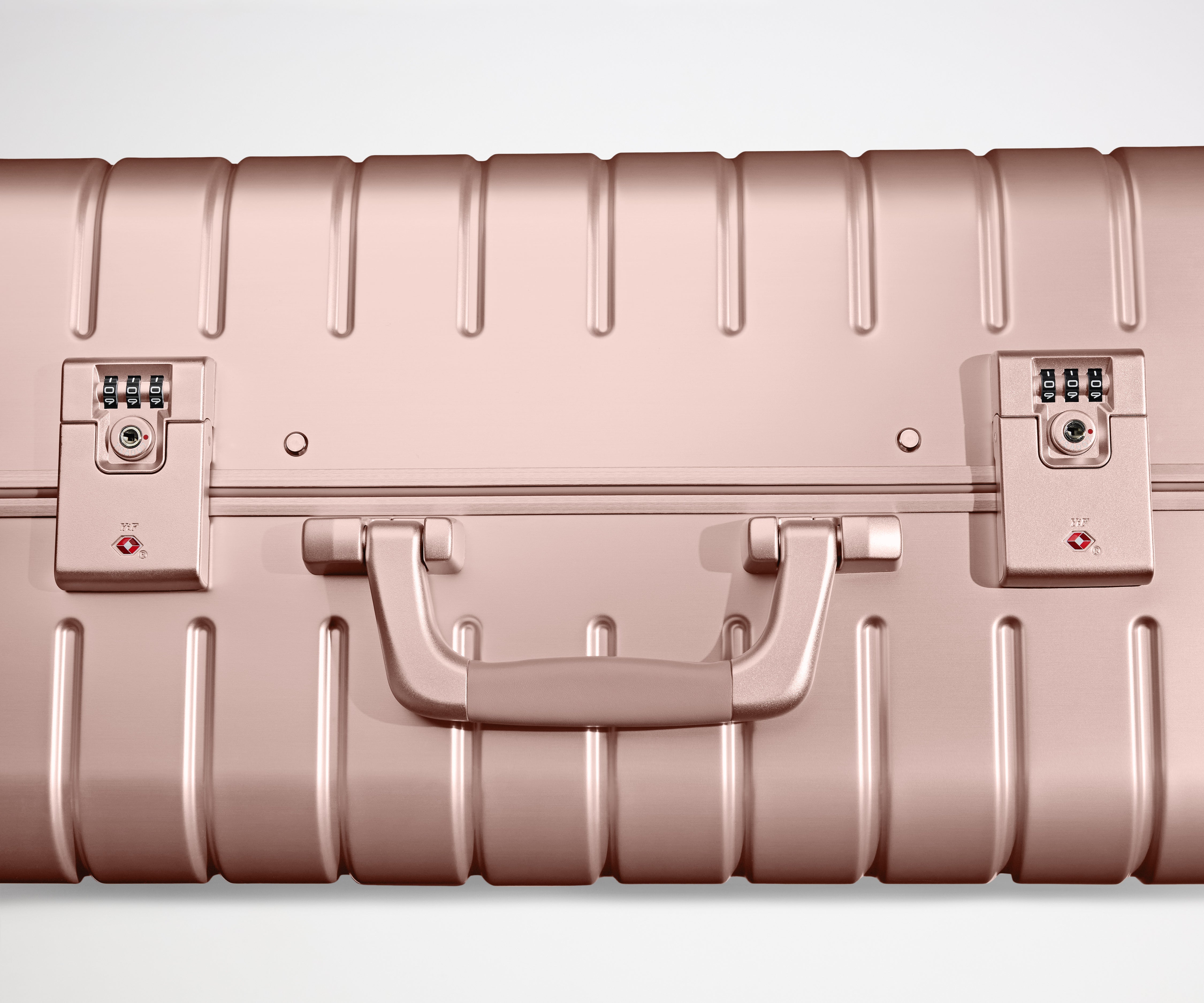 The Bigger Carry-On: Aluminum Edition in Rose Gold (with USB charger)