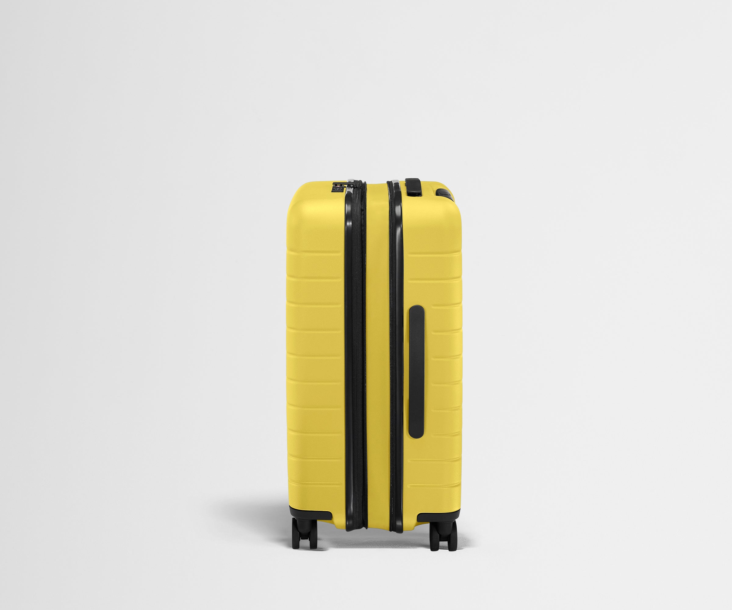 The Bigger Carry-On Flex in Sunshine Yellow