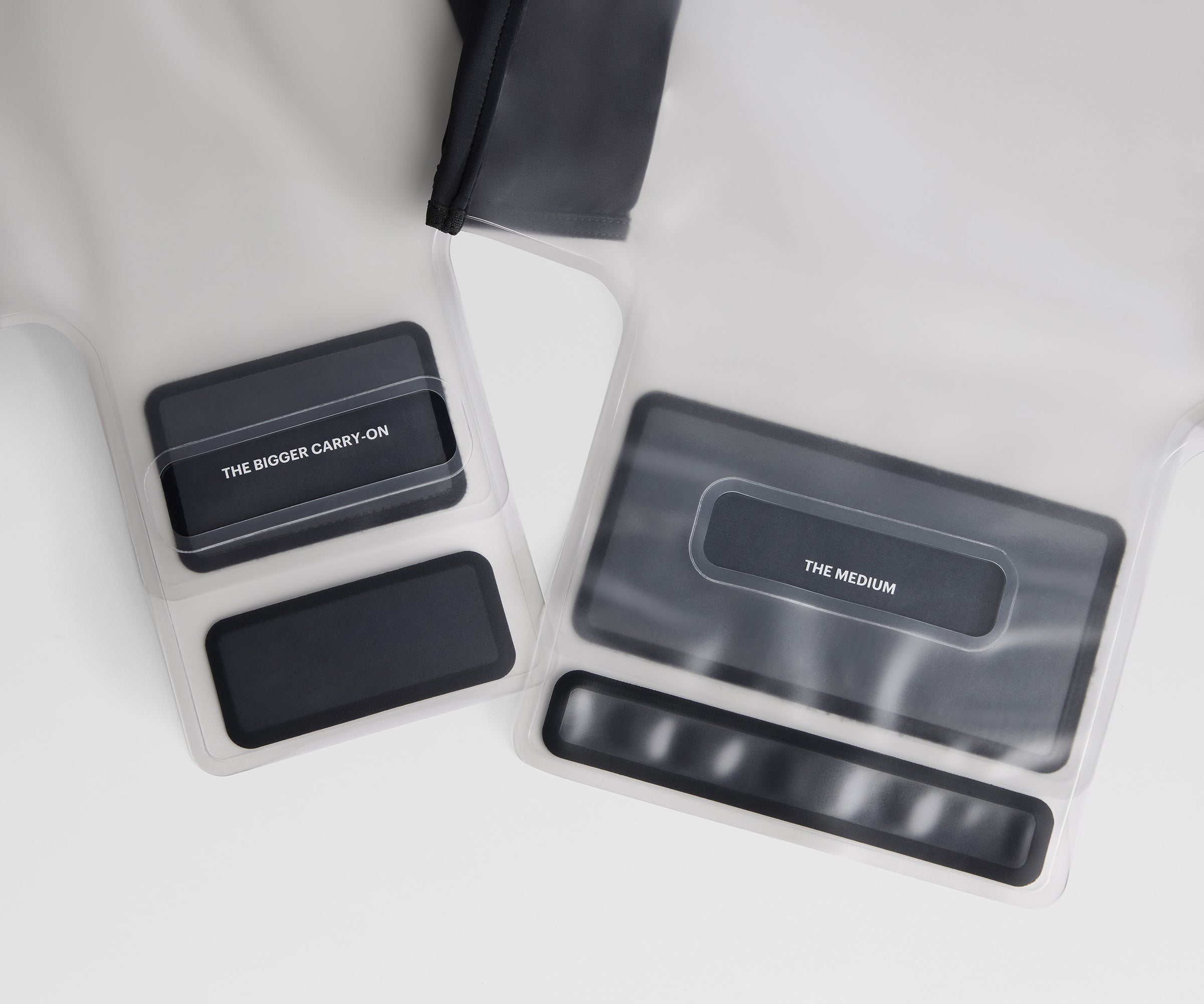 Clear Luggage Cover in The Bigger Carry-On