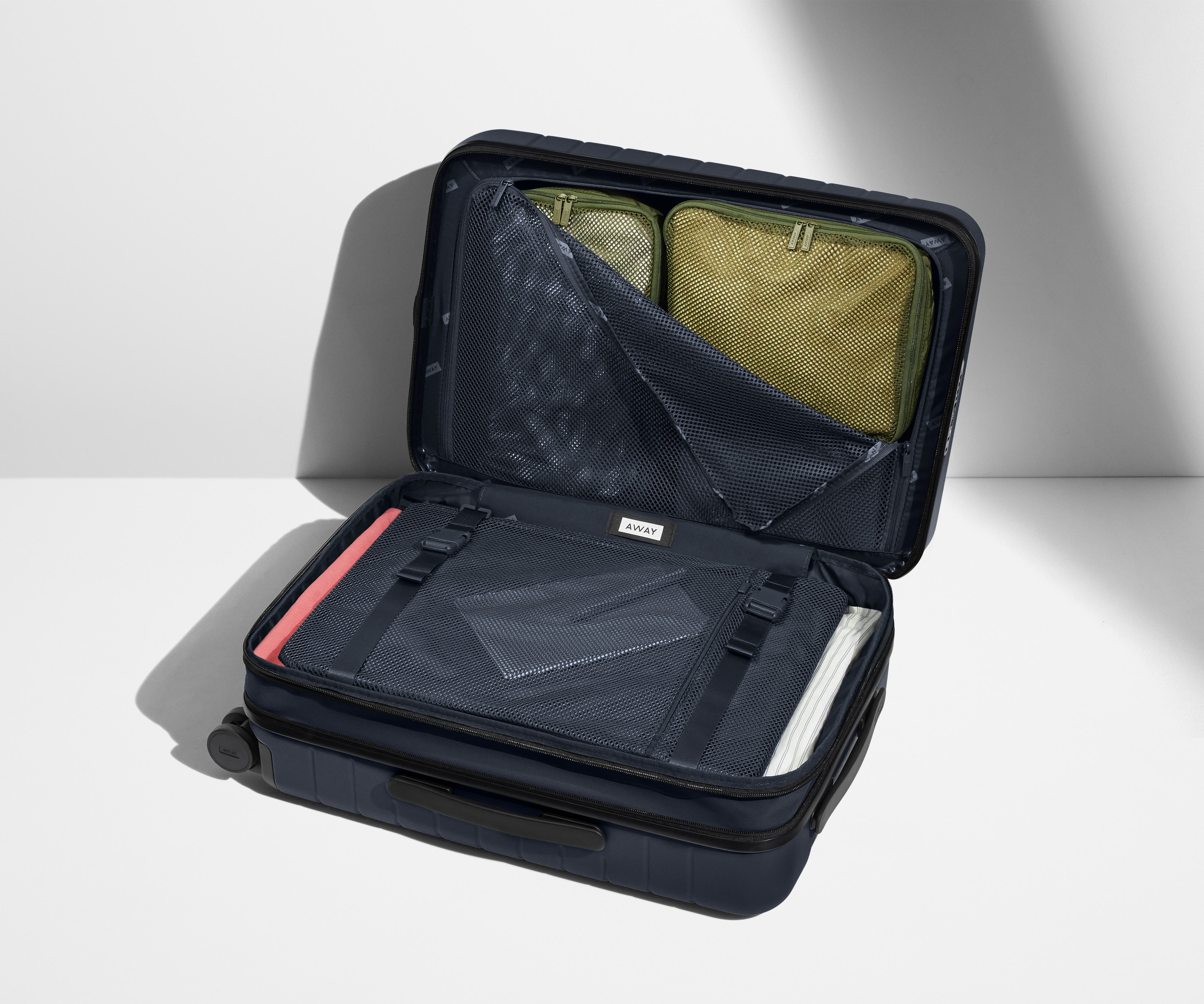 The Carry-On Flex in Navy Blue