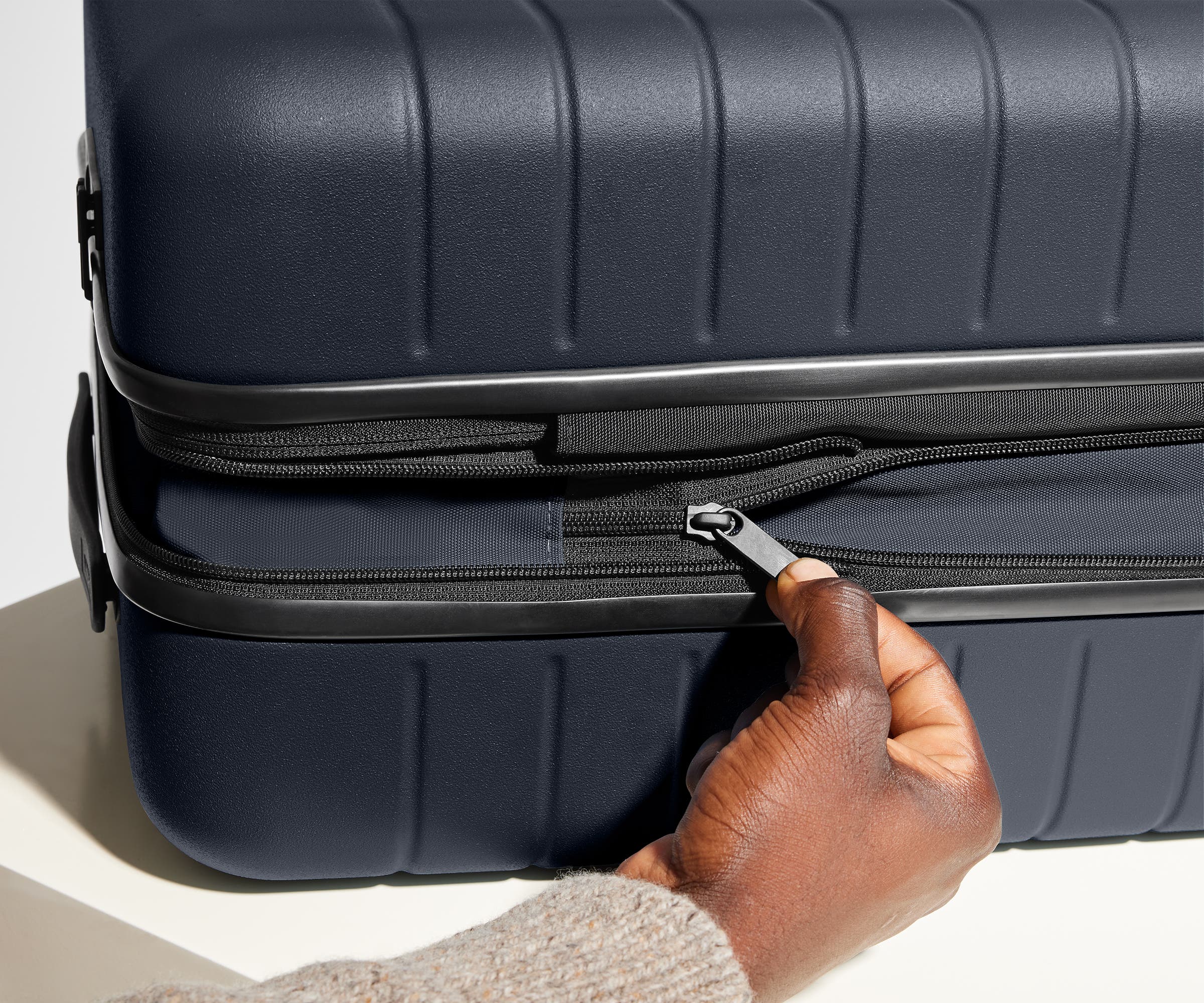 The Bigger Carry-On Flex in Navy Blue