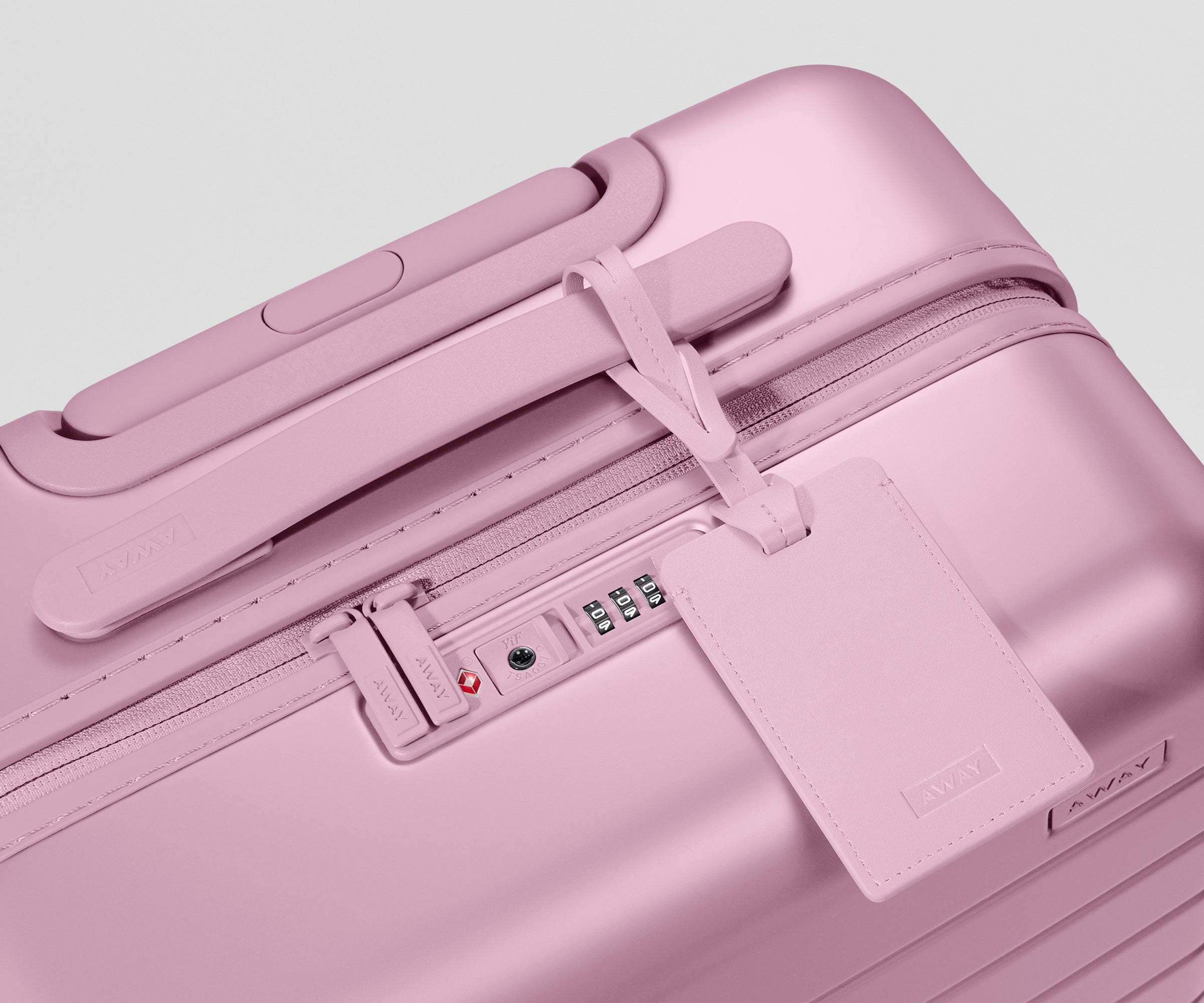 The Bigger Carry-On in Glacial Pink