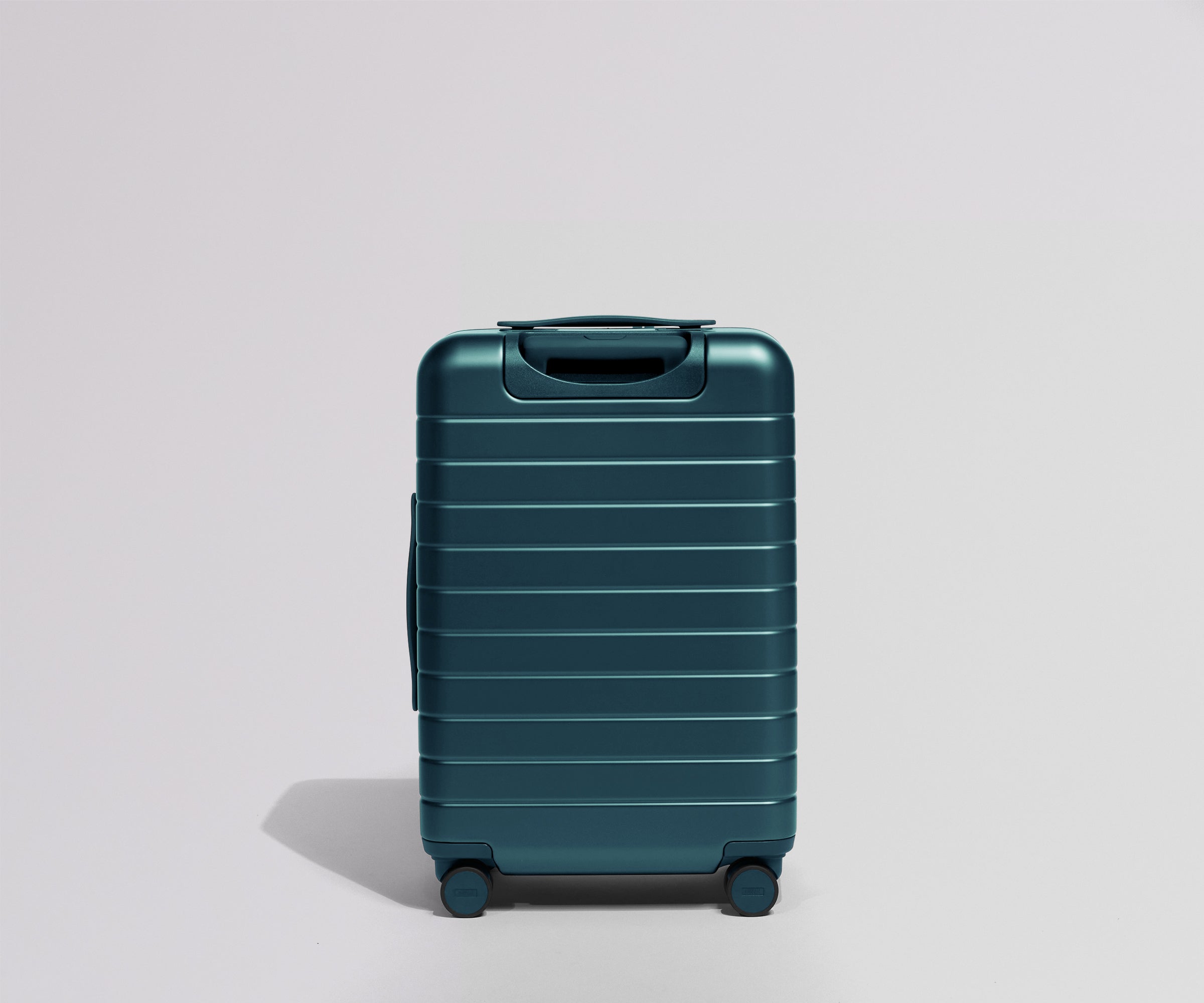 The Bigger Carry-On in Stormy Teal
