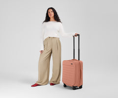 The Softside Carry-On in Clay Pink