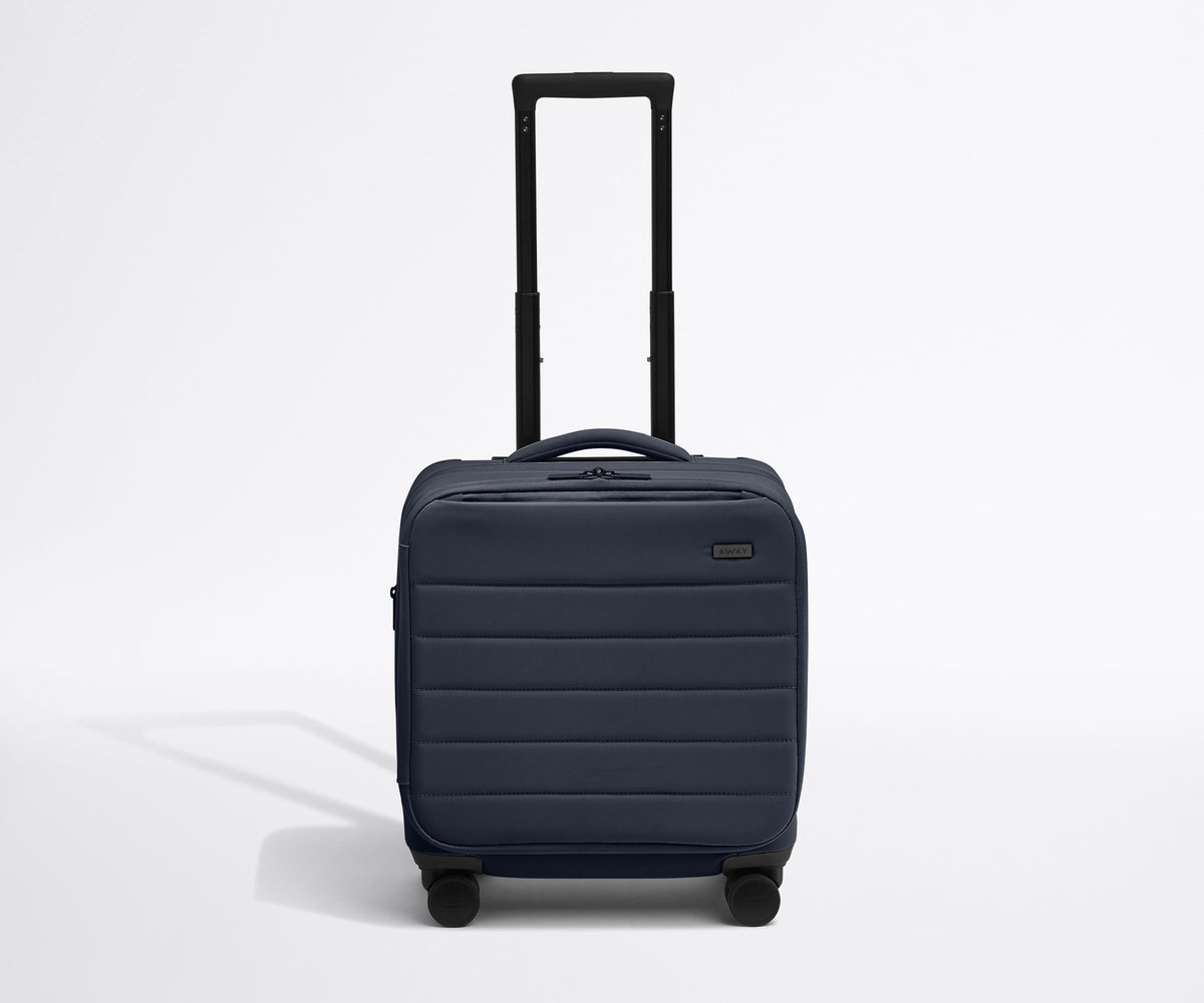 The Softside Compact Carry-On in Navy Blue