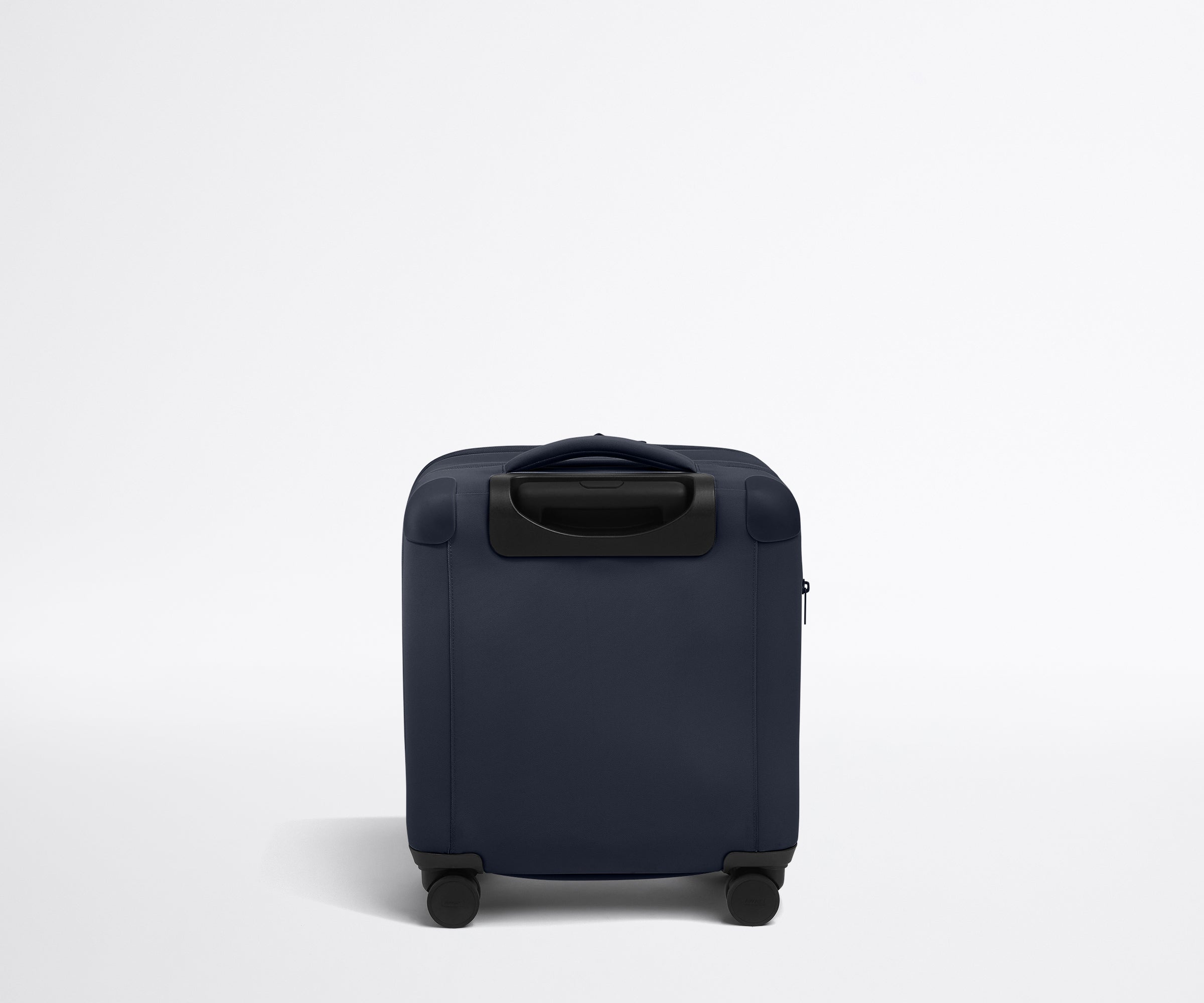The Softside Compact Carry-On in Navy Blue