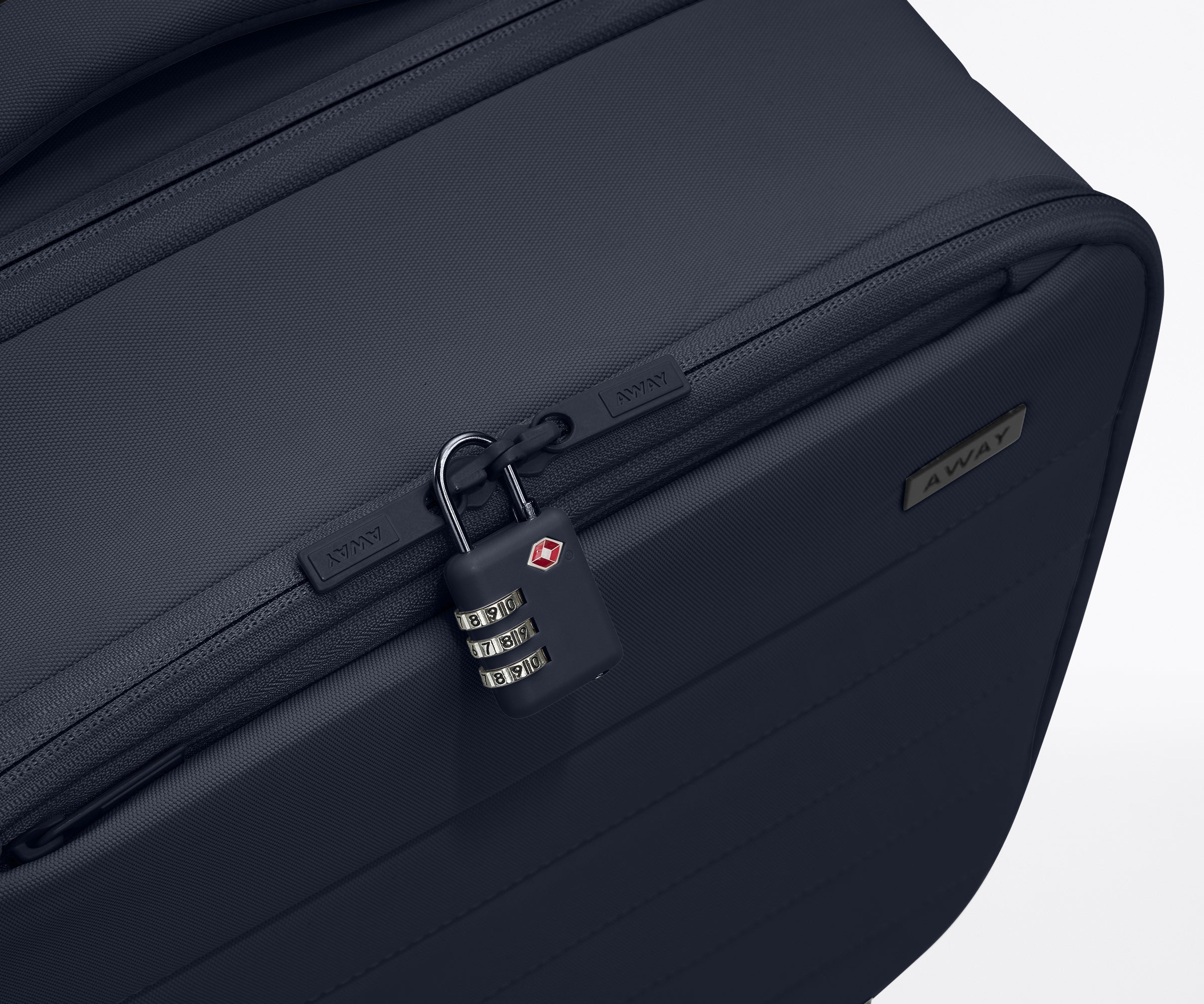 The Softside Compact Carry-On in Navy Blue