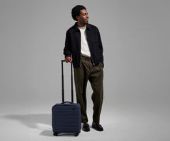 The Softside Compact Carry-On in Navy Blue