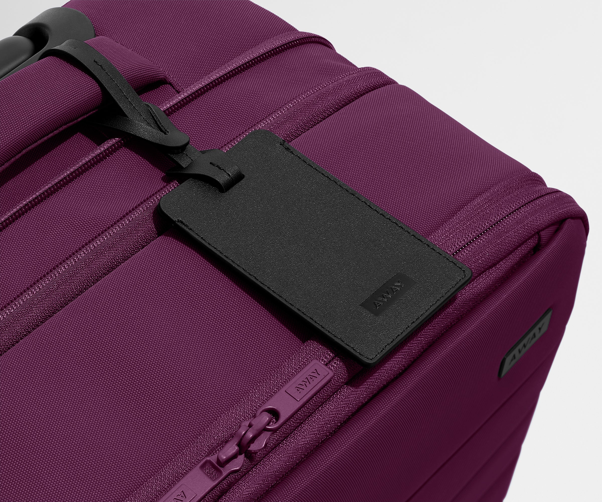 The Softside Carry-On in Plum Purple