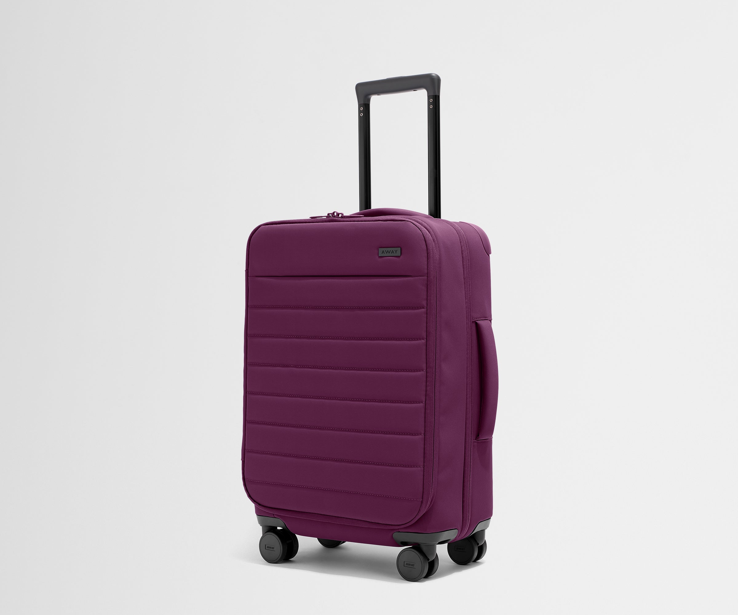 The Softside Carry-On in Plum Purple