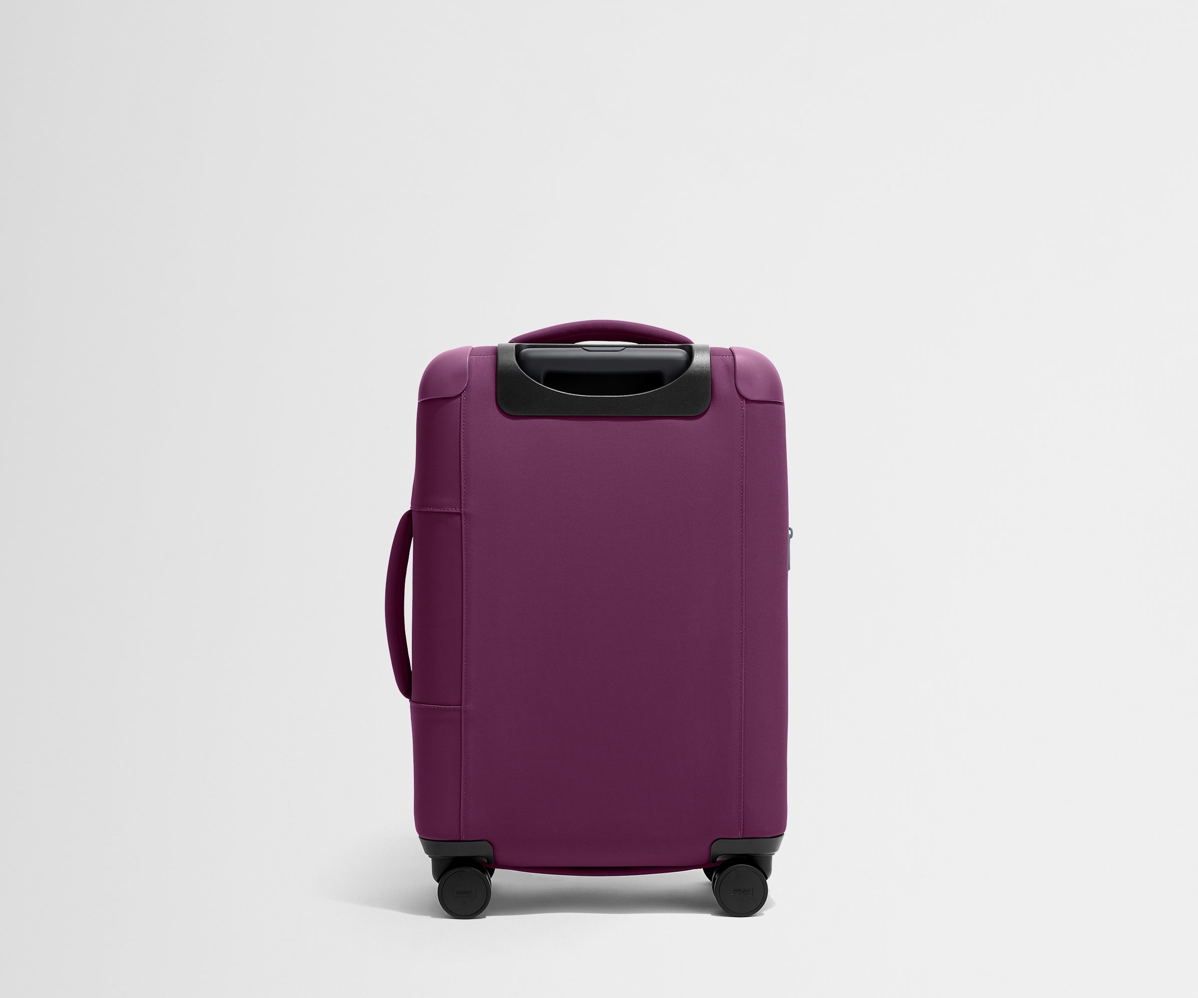 The Softside Carry-On in Plum Purple