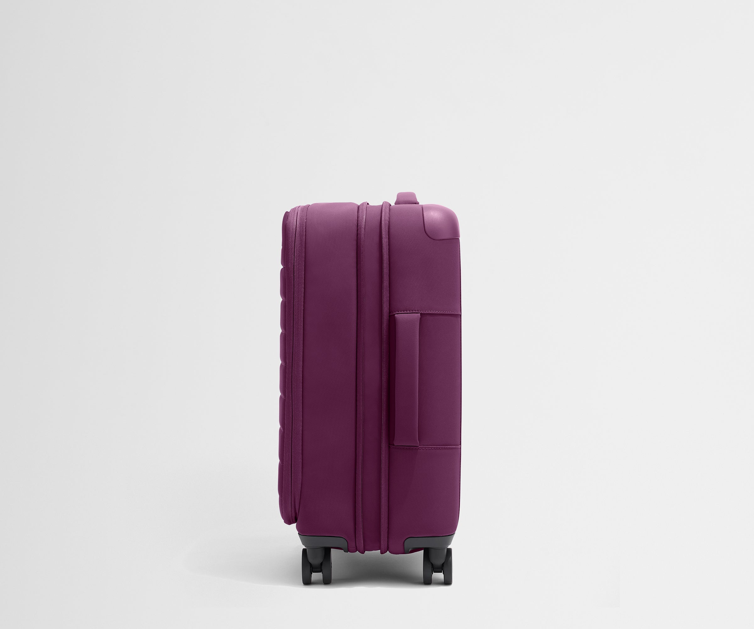 The Softside Carry-On in Plum Purple