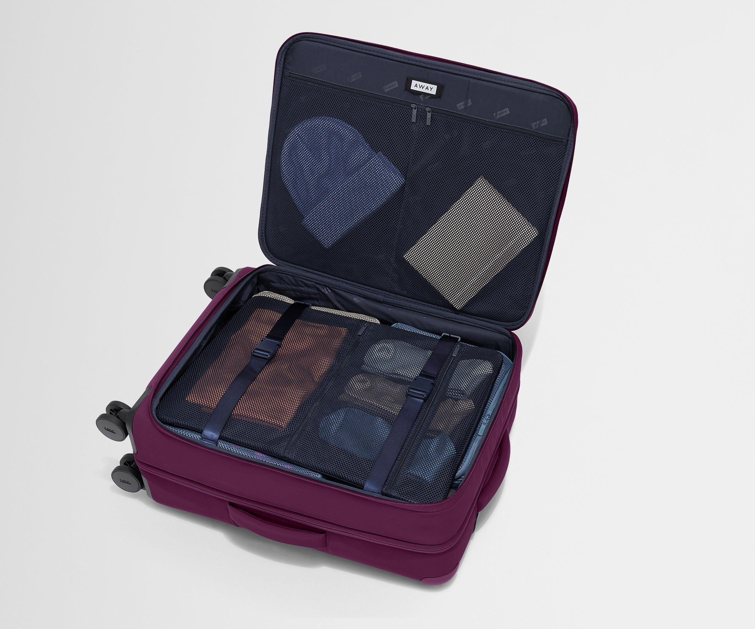 The Softside Medium in Plum Purple