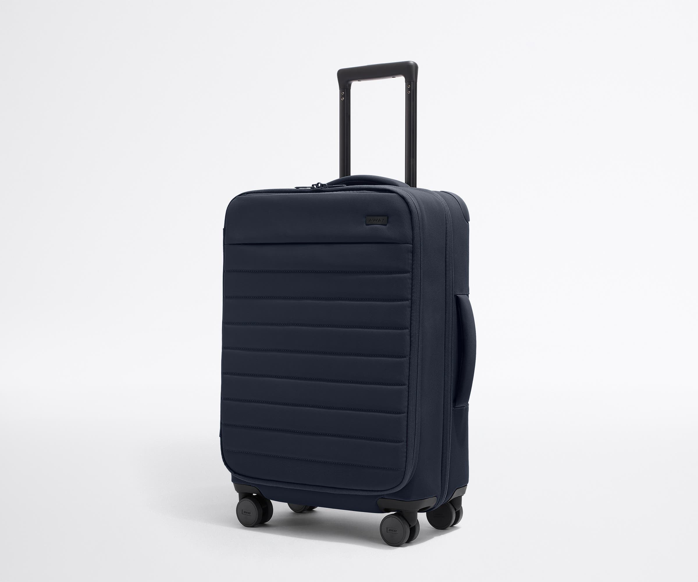 The Softside Bigger Carry-On in Navy Blue