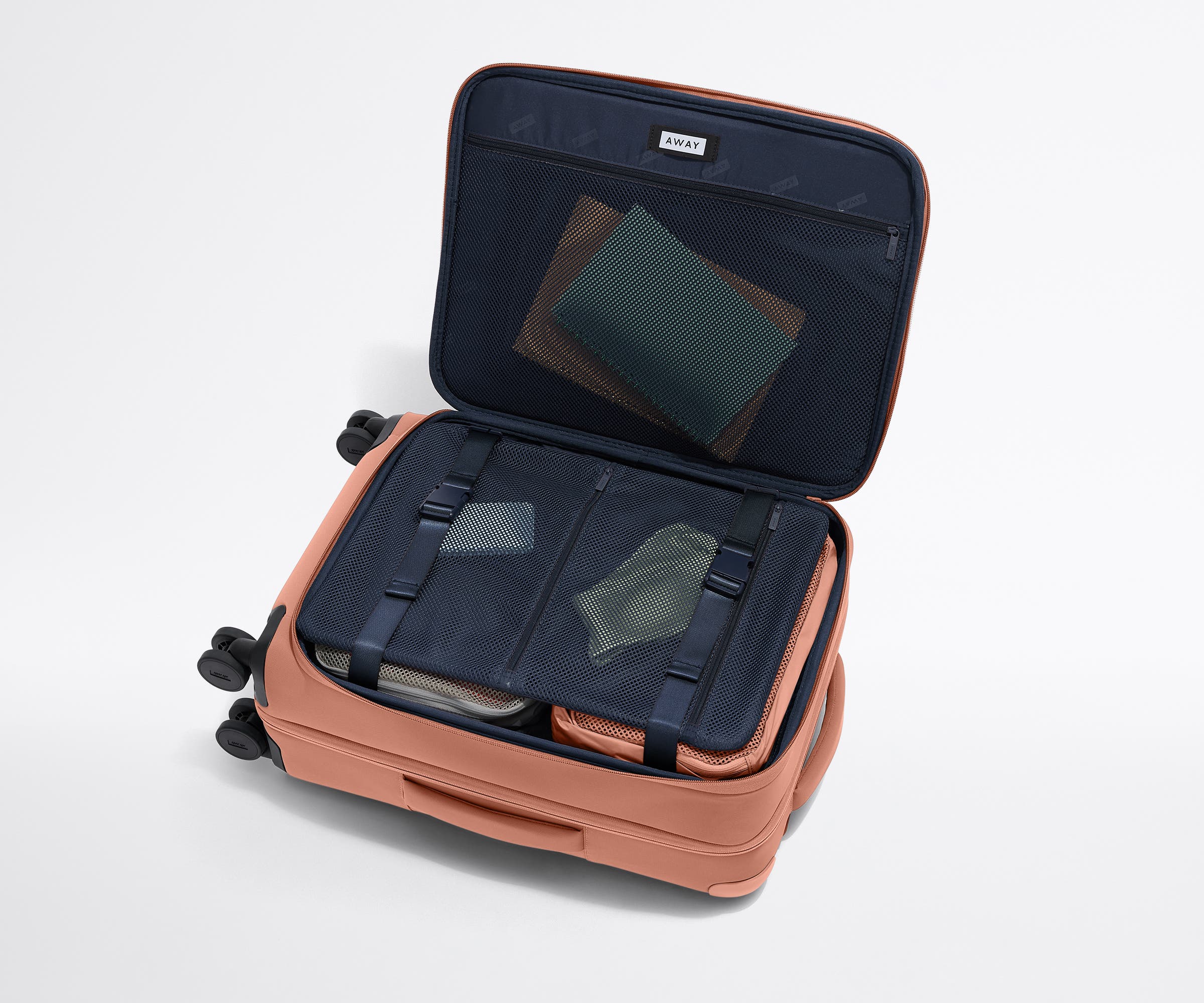 The Softside Bigger Carry-On in Clay Pink